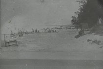 View south along the beach; lots of bathers